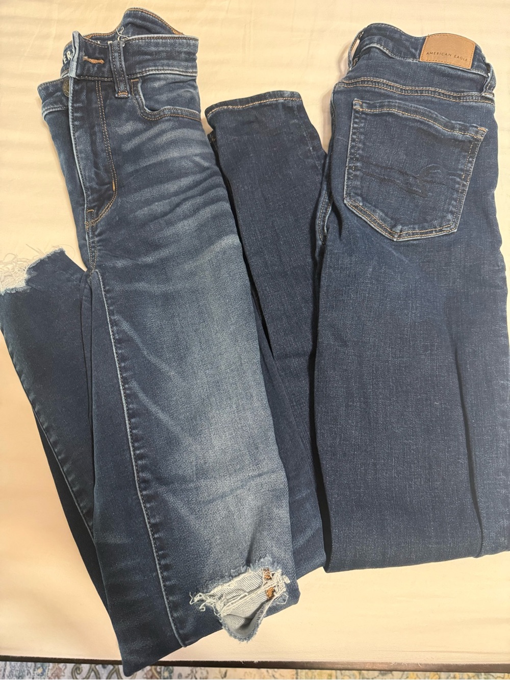 American Eagle Outfitters Blue Skinny Jeans - Distressed Hem Pair